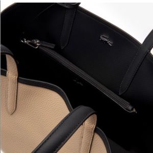 Lacoste bag perfect condition, double sens ,double color